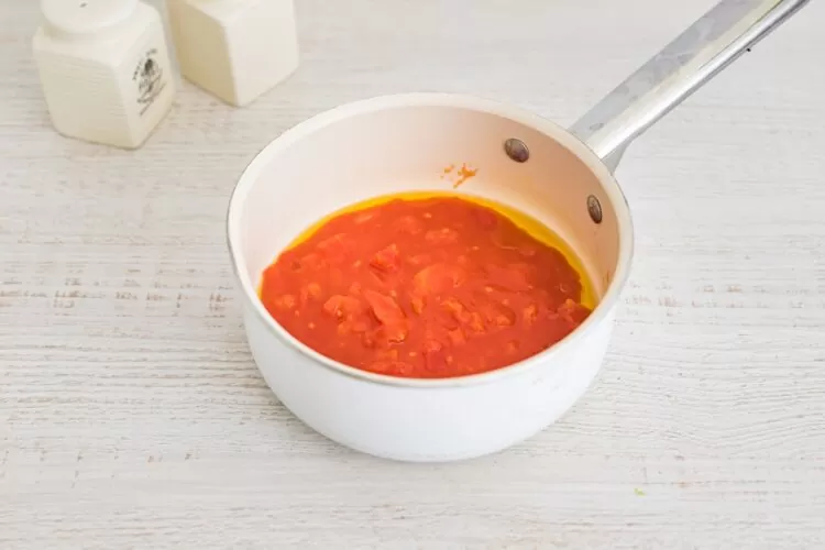 NaleÅ›niki ze szpinakiem i ricottÄ… zapiekane pod pomidorami - Krok 4